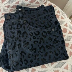 EXPRESS Jeans. High Rise-Size 6S. Black Leopard/Cheetah print on dark blue jean.